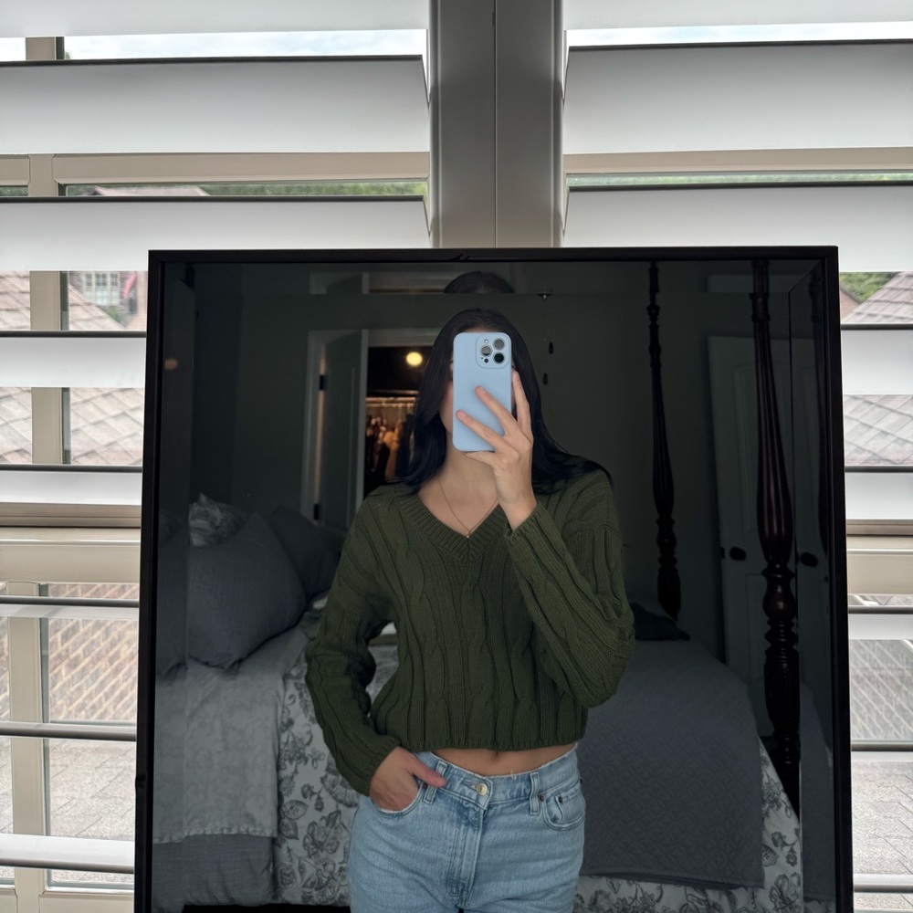 Green cable knit sweater